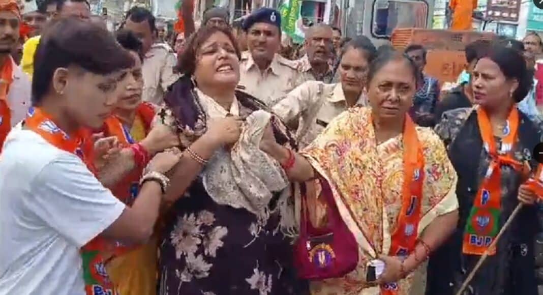 शिक्षिका और राजद समर्थक से झड़प